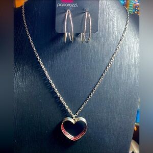 +*SOLD*+
Brand NWT red heart necklace with 2 pair of earrings